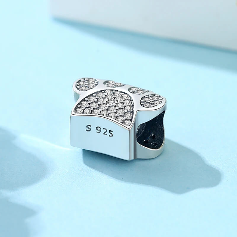 Sterling silver paw-print charm with sparkling clear zircon stones 