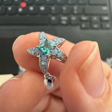 Sterling silver starfish charm with green crystal, opal stones, and pearl.
