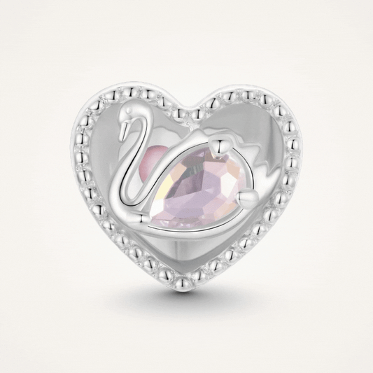 Sterling silver swan heart charm with pink crystal and pavé border - ORÉYA