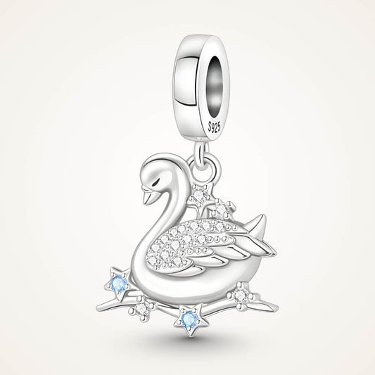 Sterling silver swan charm with crystal wings and star accents - ORÉYA