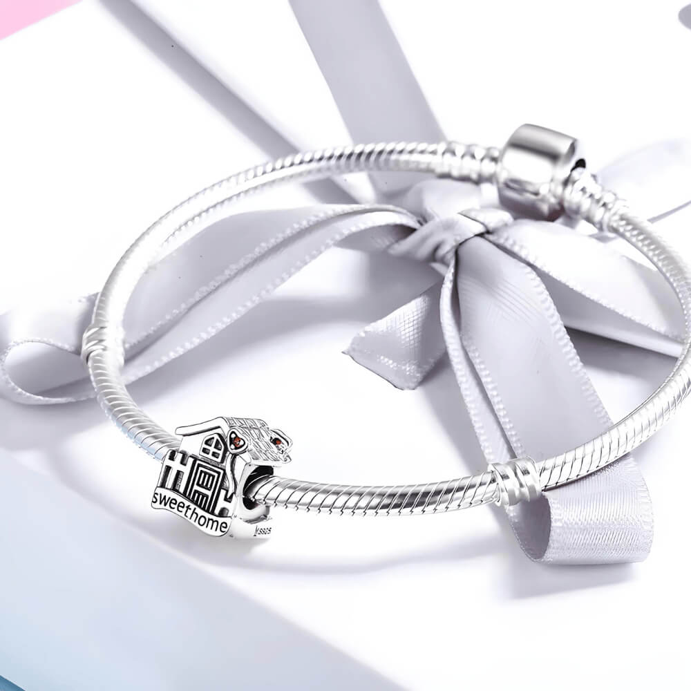 Sterling silver house charm with ‘sweet home’ engraving and red crystal hearts 