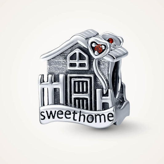 Sterling silver house charm with ‘sweet home’ engraving and red crystal hearts – ORÉYA