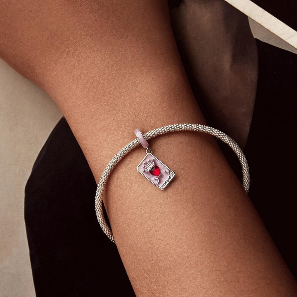 Sterling silver tarot card charm with red heart and crown.