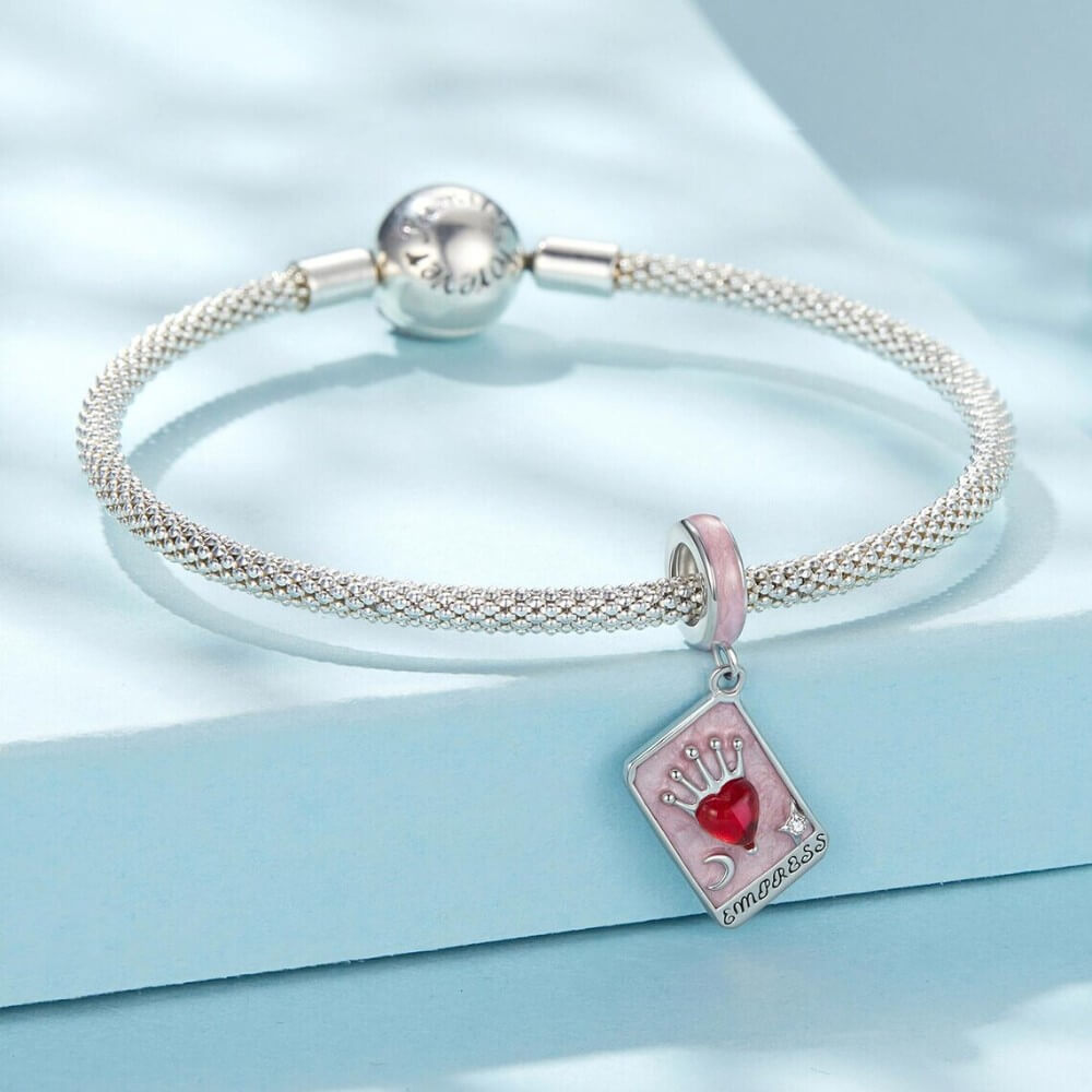 Sterling silver tarot card charm with red heart and crown.