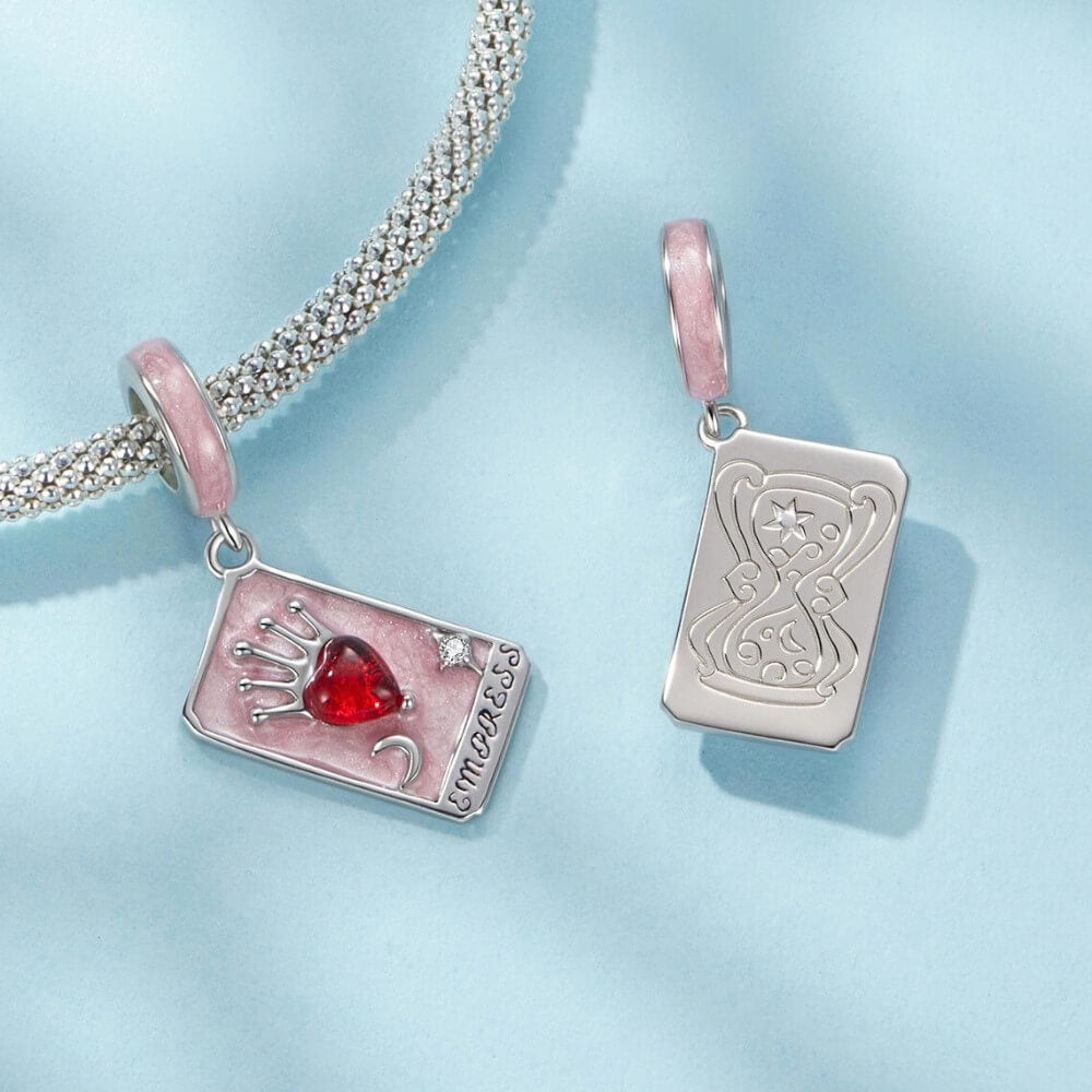 Sterling silver tarot card charm with red heart and crown.