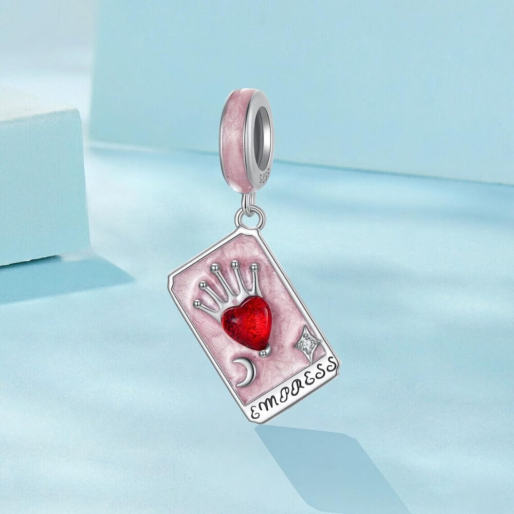 Sterling silver tarot card charm with red heart and crown.