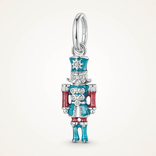 Sterling silver nutcracker charm with teal and red enamel and clear gemstones - ORÉYA