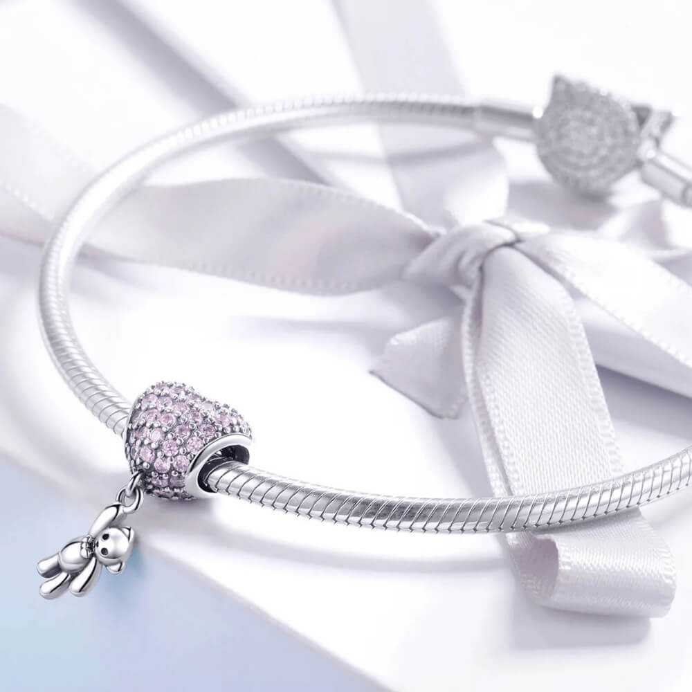 Sterling silver charm with pink crystal heart balloon and dangling teddy bear
