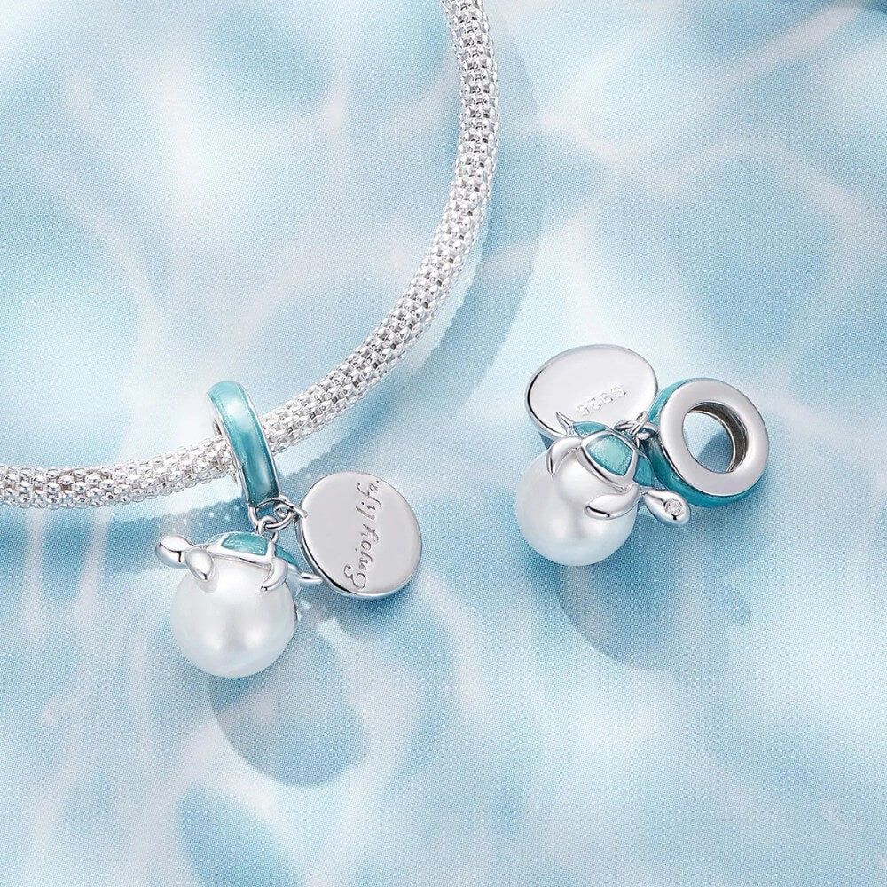 Sterling silver turtle charm with Enjoy Life engraving.
