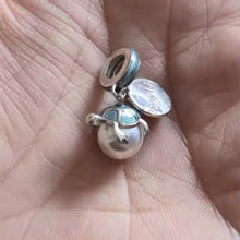 Sterling silver turtle charm with Enjoy Life engraving.