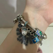 Sterling silver turtle charm with Enjoy Life engraving.