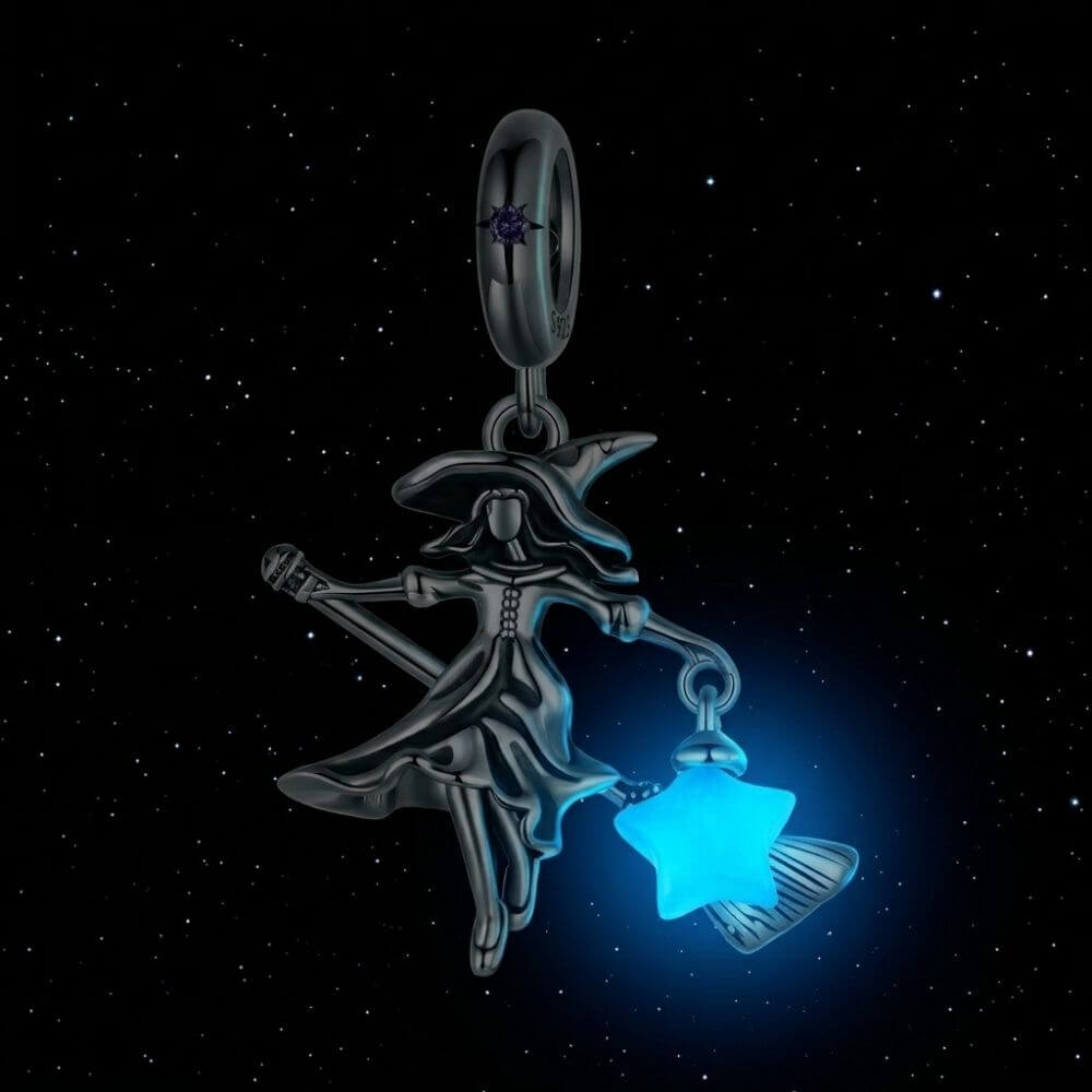 Sterling silver witch charm with broomstick, flowing dress, purple crystal, and glowing blue star lantern - ORÉYA